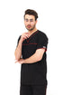 Men's black V-neck scrub top with red contrast piping from ModScrubs, featuring three pockets and a comfortable cotton-polyester blend.