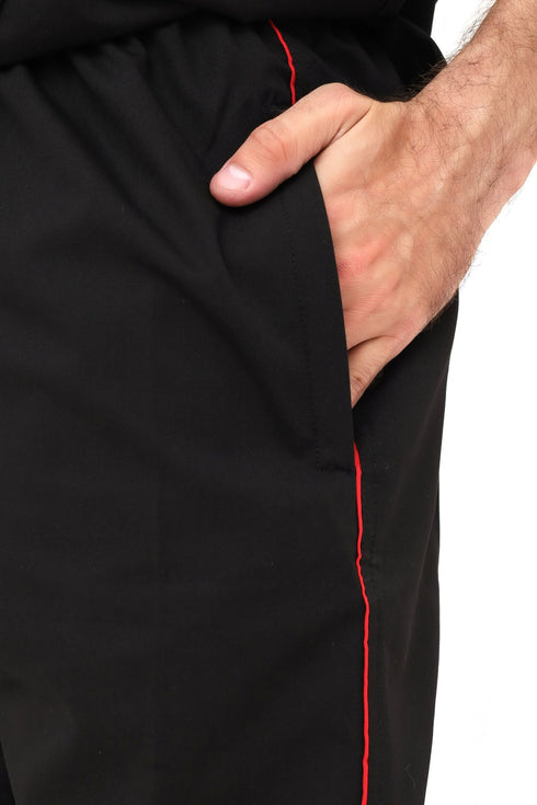 Men's black scrub trousers with V-neck top, showing three front pockets, made by ModScrubs from a cotton-polyester blend.