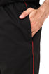 Men's black scrub trousers with V-neck top, showing three front pockets, made by ModScrubs from a cotton-polyester blend.